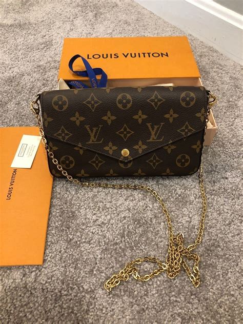 louis vuitton black bag with gold chain|louis vuitton pochette gold chain.